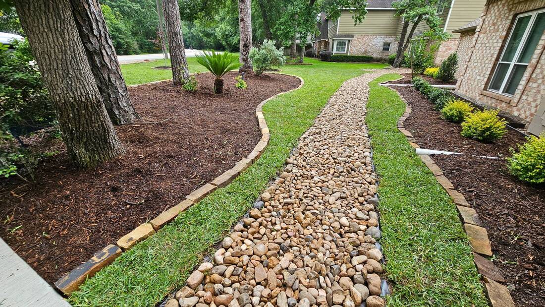 dry creek gravel for drainage installed in the woodlands tx
