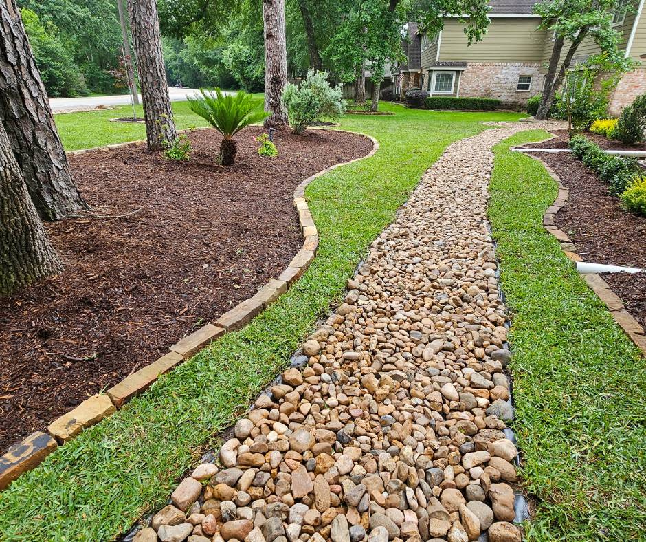 dry creek-beds installed in the woodlands tx