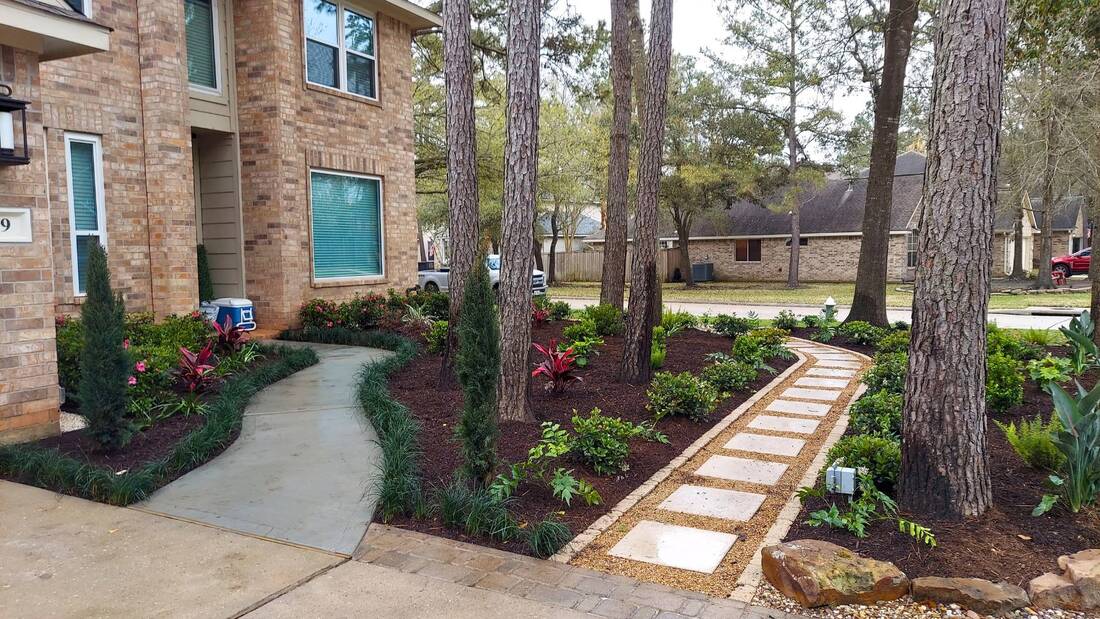 garden with stepping stones path in spring tx