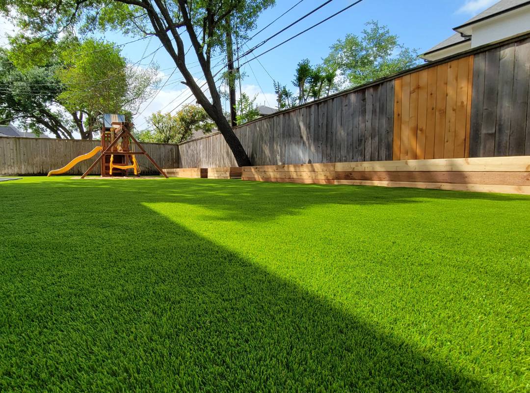 Artificial lawn and wood raised beds