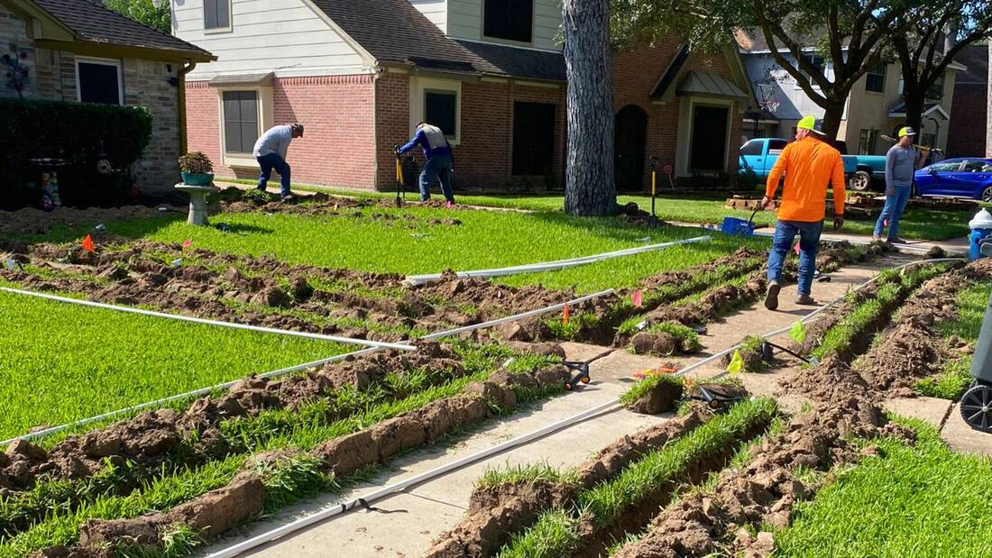 guys installing irrigation 