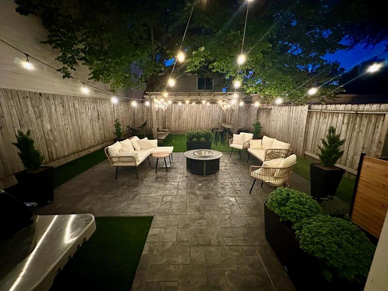 stamped patio makeover with stringlights